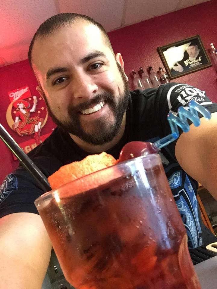 bartender with fruit drink